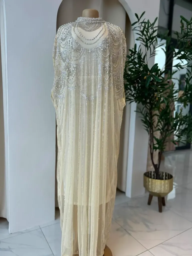 KS1238CRSF CREAM WITH GOLD STONES AND GOLD BEADS FULL KNECK KAFTAN                          -FREE SIZE